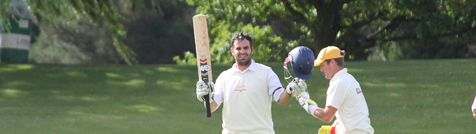 Stephan Grobler raisies his bat after bringing up his century against Otago Country
