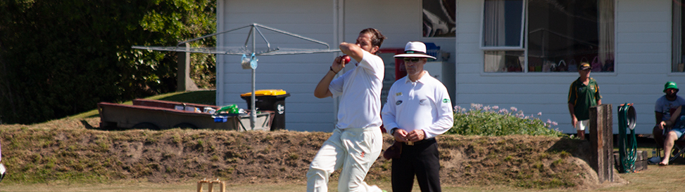 Francois Mostert bowls against Bullar in the Hawke Cup Challenge